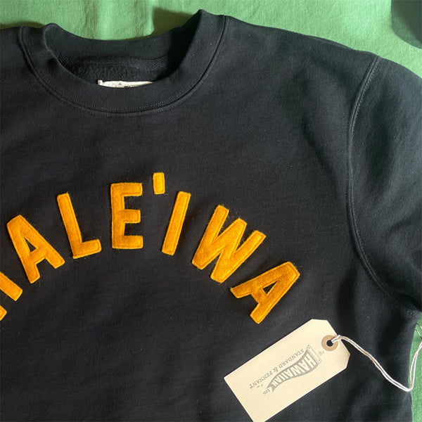 HALE`IWA- athletic gold on black